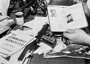 View of Hands Near Communist Literature