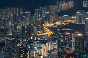 View of Hong Kong highway pass through residential blocks in Kowloon