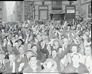 View of Jubilant Crowd in Street