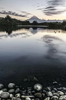 Images Dated 30th November 2011: View over a lake towards Mt. Egmont, Mt. Taranaki, currently an inactive volcano, North Island