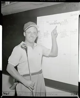 View of Lou Barbaro Pointing to Golfing Board