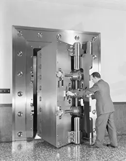 Vault Prints: View Of Man Opening A Bank Vault
