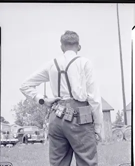 Back View of Man Wearing Illegal Surveillance Transmitter