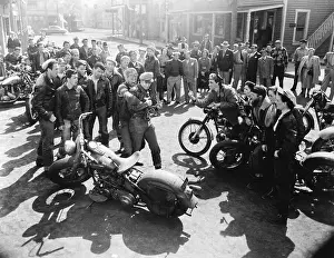 Prints of (Original Caption). Marlon Brando in scenes from the movie: The Wild One The Iconic Moments Captured: View of Marlon Brando on Set