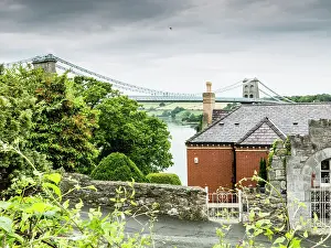 View of the Menai suspension bridge (1826) designed by Thomas Telford from near Bangor:The Wales Coast Path - north Wales