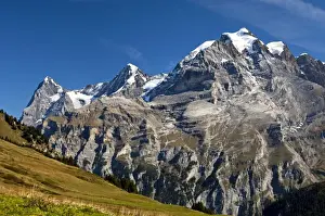 View of Mt. Eiger, Mt. Moench and Mt. Jungfrau, from left to right; UNESCO World Heritage Site Jungfrau-Aletsch protected area, Muerren, Bernese Oberland, Switzerland, Europe