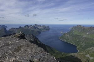 View from Mt Keipen, 936m, fishing village of Husoey at the back, Senja Island, Troms, Norway