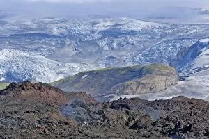 Volcano Collection: View across new lava fields created by a volcanic eruption in 2010 to the Myrdalsjokull glacier