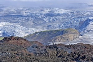 Images Dated 19th August 2011: View across new lava fields created by a volcanic eruption in 2010 to the Myrdalsjokull glacier