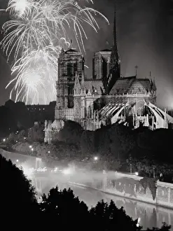 Bastille Day Prints: View of Notre Dame Under Firework Display