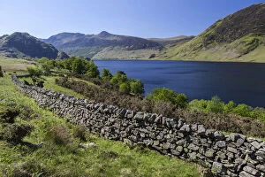 Stone Wall Gallery: View over an old English stone wall towards the blue lake of Crummock Water