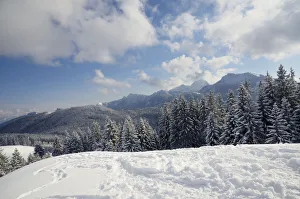 Images Dated 9th February 2013: View from the peak of Mt Schwarzenberg to a snow-covered alpine upland and the Wendelstein Range