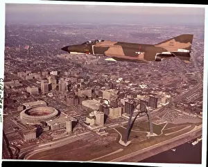 View of Phantom Jet Flying Over St Louis Landmarks