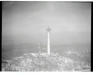 View of Radio Tower over Wooded Area