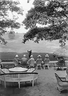 Country Club Prints: Back View of Sitting Fans Watching Golfer