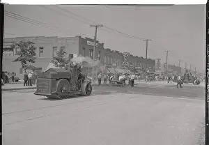 Queens Prints: View of Steamroller Moving Down Street