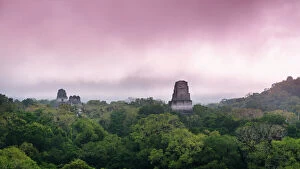 Images Dated 28th February 2015: View of Tikal temples in the forest at sunrise