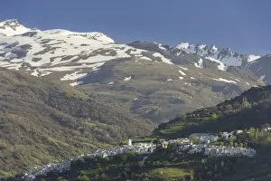 Sierra Nevada Prints: View over the town of Pampaneira towards the snow-capped Sierra Nevada Mountains
