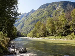 Riverbank Gallery: View of turquoise Soca river and the Julian Alps in the Soca Valley near Bovec