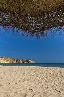Images Dated 9th September 2012: View from underneath a parasol out onto the beach, Praia da Mareta, Sagres, Algarve, Portugal