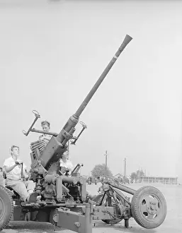 View of Woman Manning Antiaircraft Gun