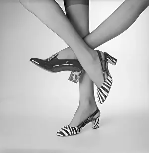 View of Women's Feet Wearing High Heeled Shoes