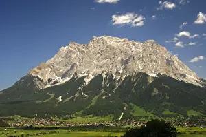 Cloudy Prints: The village Ehrwald at the foot of the Wettersteingebirge mountains with Mt