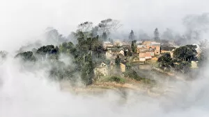 Images Dated 15th January 2013: A Village in the fog