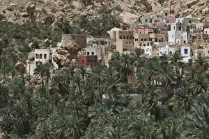 Village with palm trees at the end of Wadi Shab mountain ravine, Hadjar-Gebirge, Hadschar-Gebirge, Tiwi, Oman