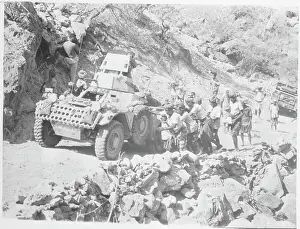 Aden Prints: Villagers Helping British Troops Push Armored Car