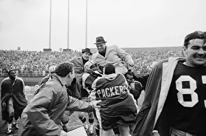 Vince Lombardi Being Carried in Victory