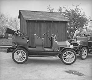 Images Dated 6th November 2006: Vintage convertible cars by shack, (B&W)