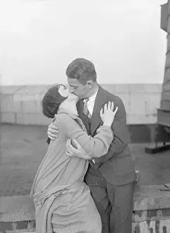 Hugging Prints: Vintage photograph showing couple engaged in kiss