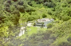 Vintage souvenir postcard, Cher's Home, Homes of Movie and TV Stars, ca 1978