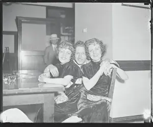 Violet Hilton, Daisy Hilton, and Maurice L. Lambert Smiling