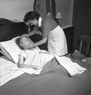 Health Care Prints: Visiting Nurse Tending to Bedridden Patient