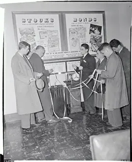 Visitors Attending Stock Exchange Display