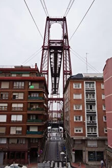 Images Dated 31st July 2015: Vizcaya Bridge between houses in Portugalete, Spain