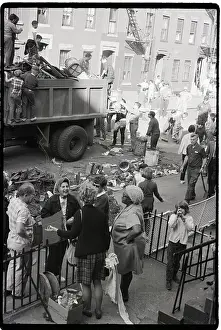 Volunteer Prints: Volunteers Clean Up Block; Garbage Truck