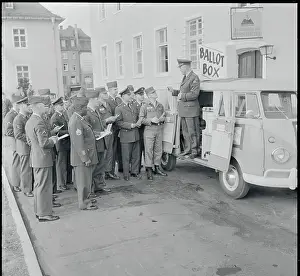 Voting Officer Speaking with American Soldiers