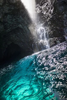 Coastal Collection: Waiahuakua sea cave explored on boat tour of Na Pali Coast, Kauai, Hawaii, USA