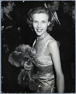 Opening Night Prints: Waist-Up Smiling Honor Blackman at Premiere