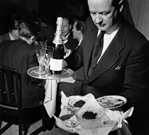 Champagne Prints: Waiter Holds Platters of Caviar and Champagne