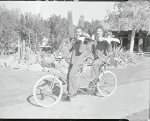 Nonconformity Prints: Waiters Riding Bicycle with Trays in Hand