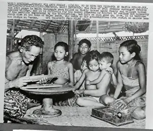 Bali Prints: Wajan Bedet Reading Stories to Family