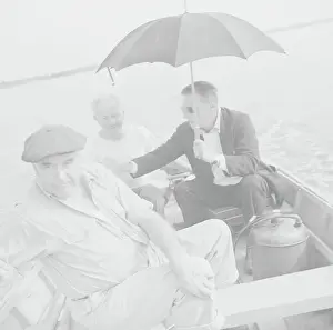 Walker Evans Prints: Walker Evans Holding Umbrella