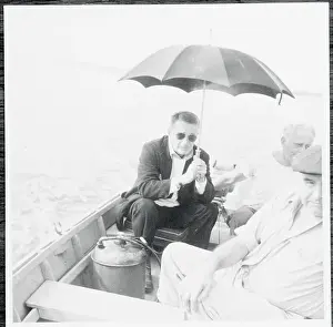Walker Evans Prints: Walker Evans Holding Umbrella