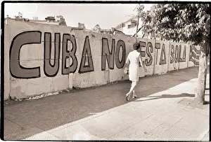 Painted Prints: Wall with Cuba is Not Alone Painted on it