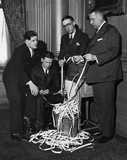 Economics Prints: Wall Street Brokers Read Ticker Tape