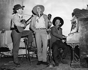 Santa Barbara Prints: Walt Disney and Men Playing Instruments